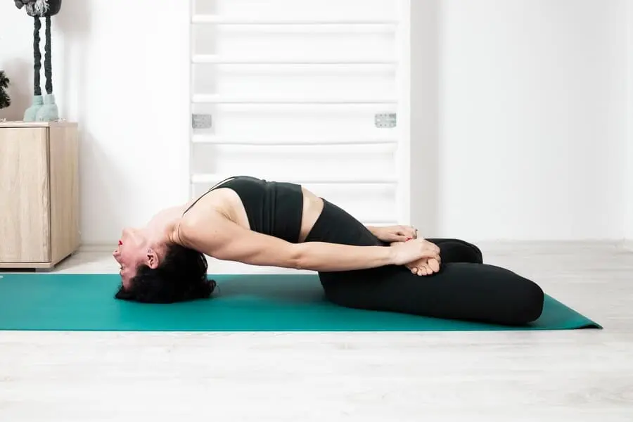 reclining butterfly pose (yoga)